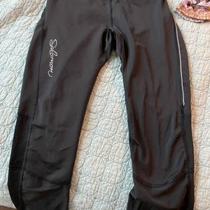 Solomon nylon running pants with reflection on the side, zipper at the ankle